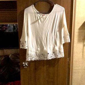 White blouse with beautiful stitching on bottom and sleeves